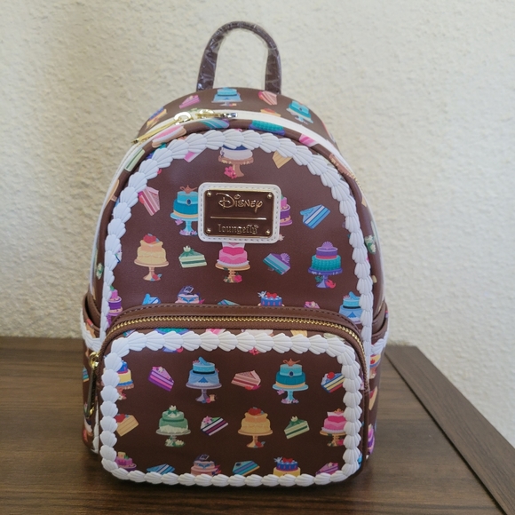 Loungefly Handbags - Princess Cakes Loungefly Mini Backpack Disney 10.5 Inch NEW All Over Print AOP